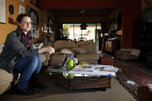 Angela Hockabout is photographed at the house of her mother in-law in Alameda, Calif., on Friday, April 3, 2015. Angela and her husband with their two kids